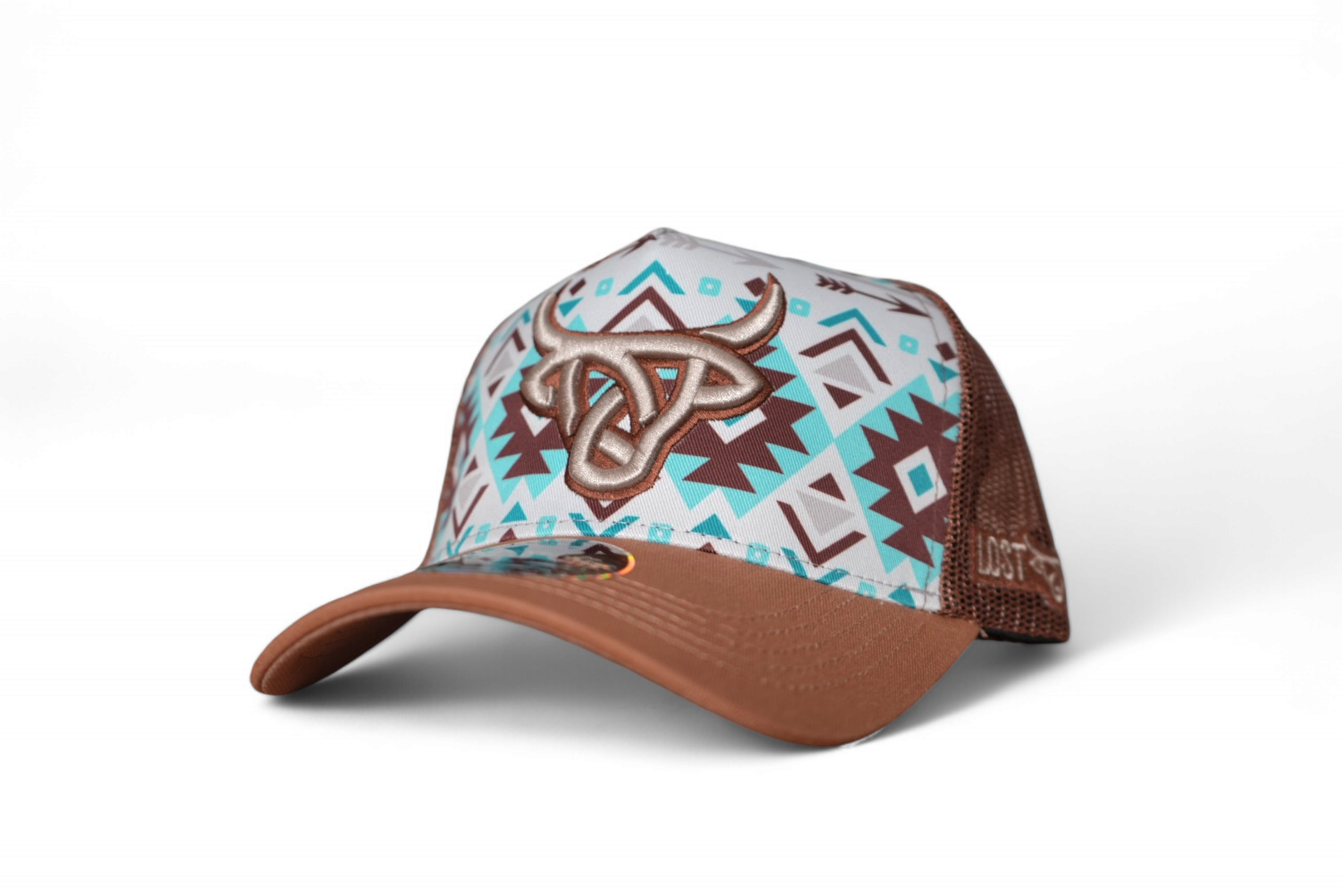 A-Frame baseball cap featuring a white Lost Calf logo on a blue and brown Aztec design with a light brown rim and matching mesh back.