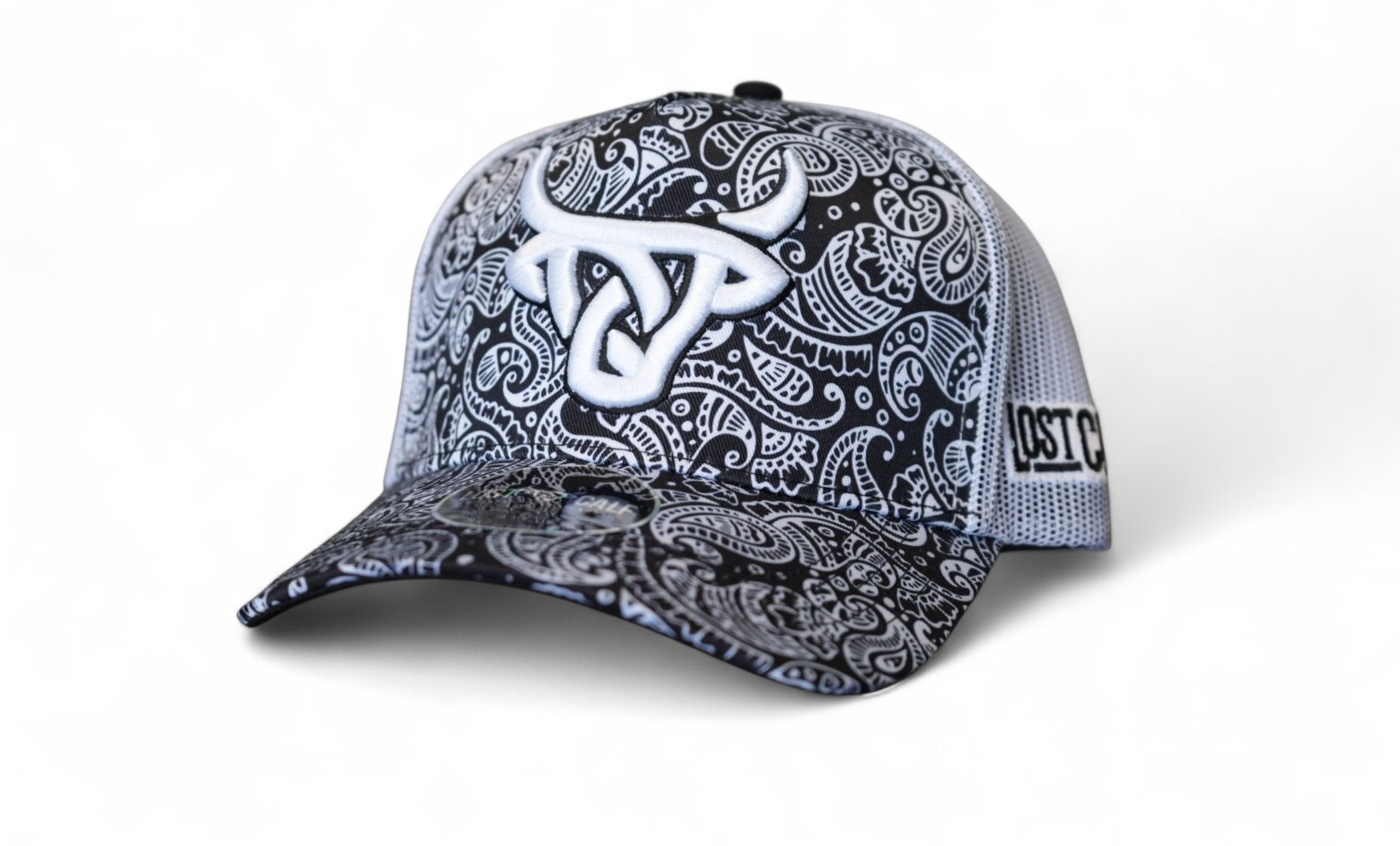 Black and white bandana patterned cap with bold white embroidered brand logo up front, white breathable mesh in back.