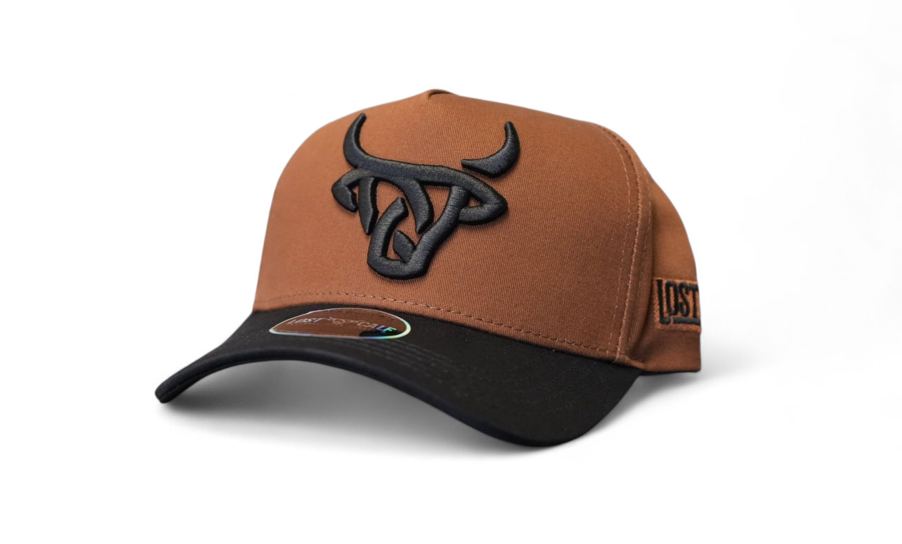 Brown and black cap with a black embroidered Lost Calf logo up front