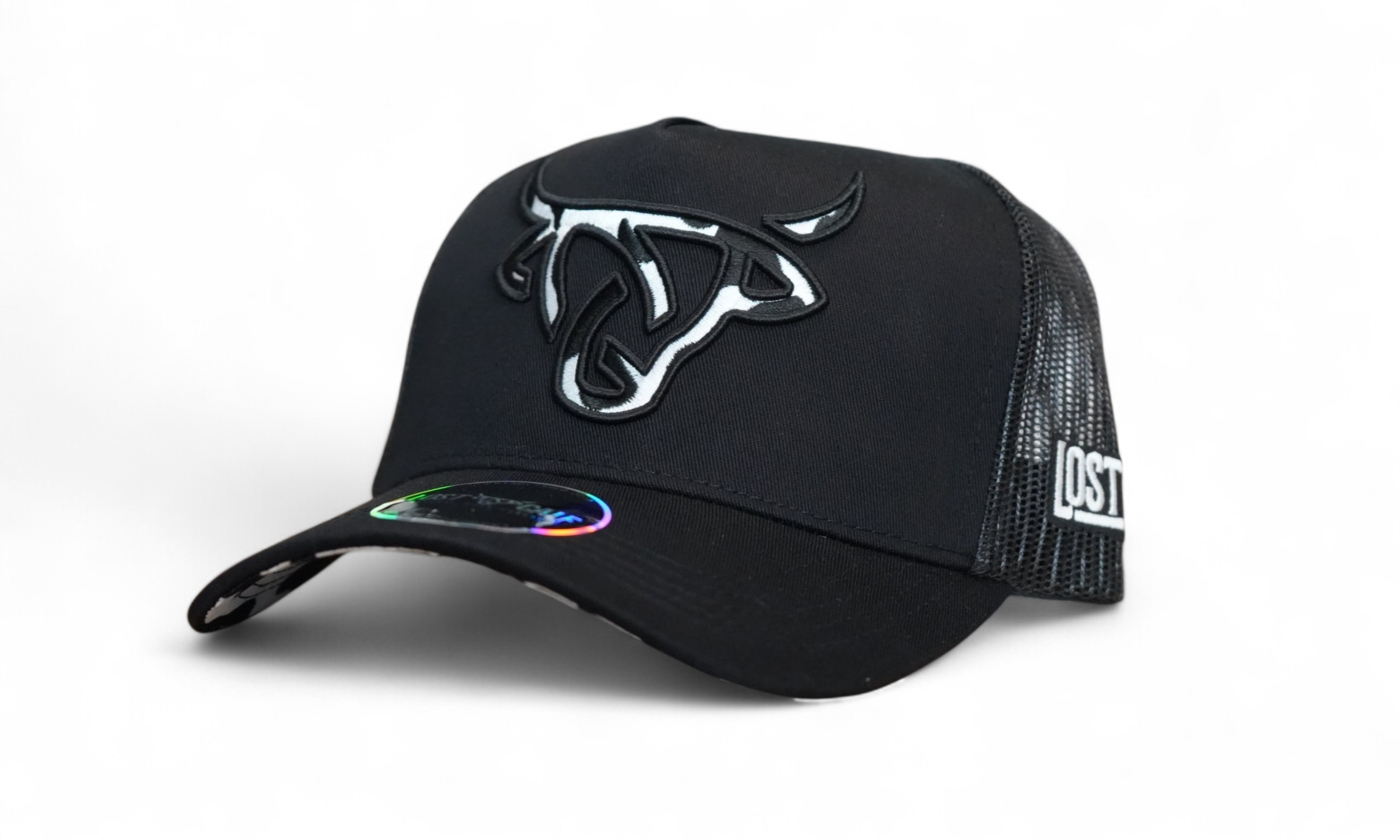 Full black A-Frame snapback with black mesh in back, a Lost Calf logo filled with a cow-pattern up front