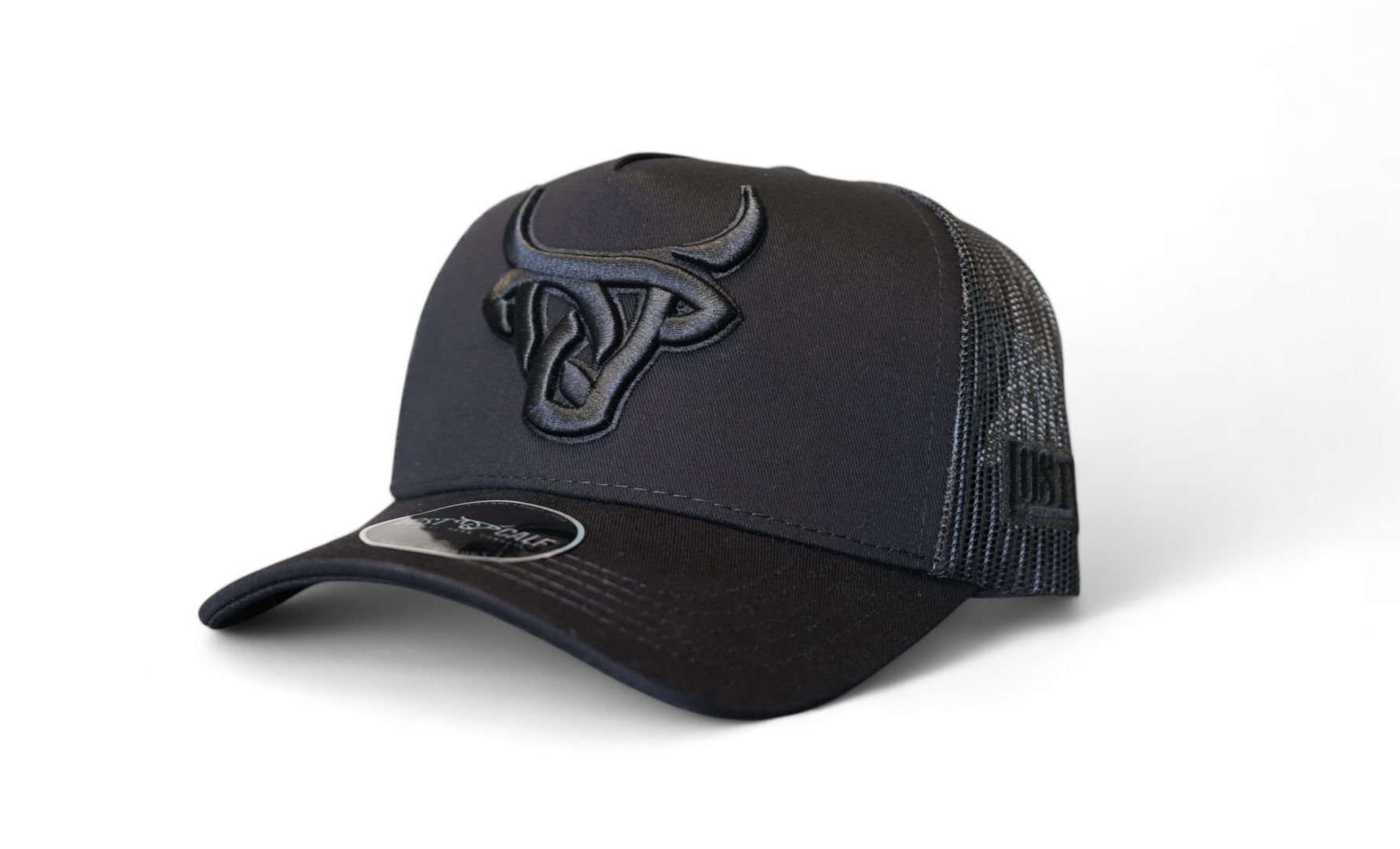 Dark grey trucker cap with dark grey mesh in back, and a dark grey Lost Calf logo up front
