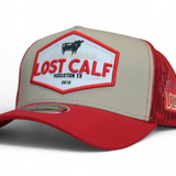 Red and beige cap with a Farm patch stating 'Lost Calf' 