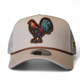 Light khaki snapback A-Frame hat with a colorful rooster design outlined in brown